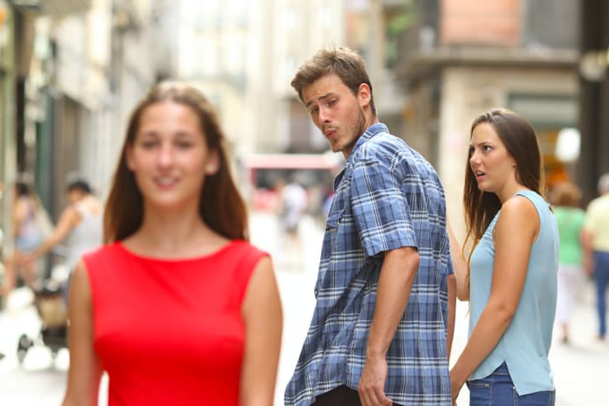 Distracted Boyfriend meme about Frenchie Bulldog